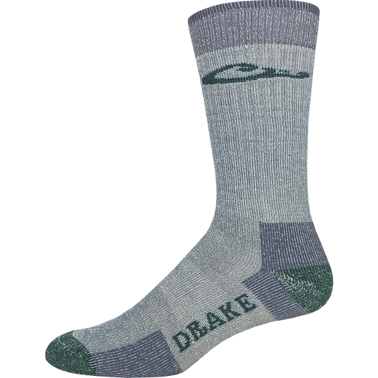 Close-up of Medium Weight Merino Wool Crew Sock, highlighting its reinforced heel and toe, ideal for comfort and durability in outdoor activities.