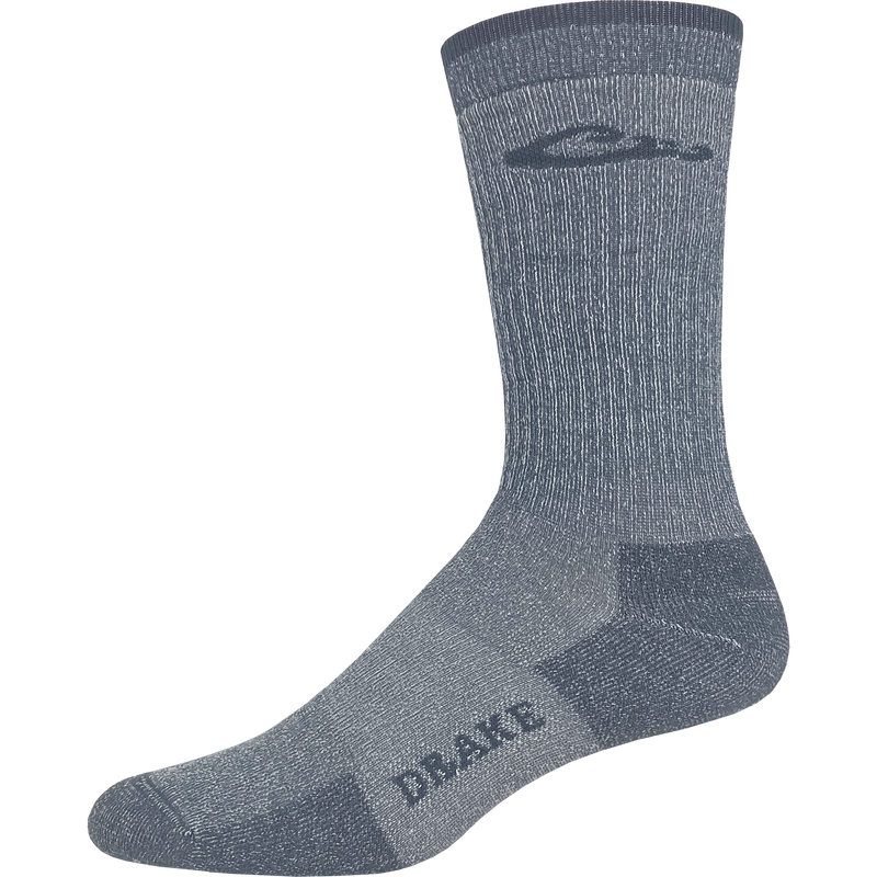 Light Weight Merino Wool Crew Sock with arch support, reinforced heel, and seamless toe, designed for comfort and durability, ideal for hunting and outdoor activities.