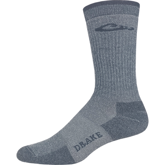 Light Weight Merino Wool Crew Sock with arch support, reinforced heel, and seamless toe, designed for comfort and durability, ideal for hunting and outdoor activities.