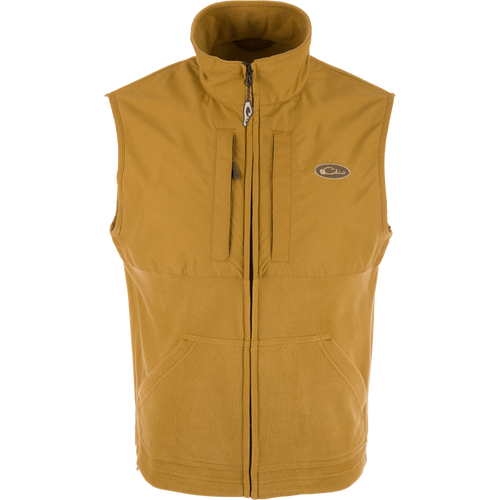 MST Eqwader Vest showcasing upper waterproof fleece and breathable lower polyester, featuring chest Magnattach™ and zippered pockets, designed for hunting efficiency and comfort.