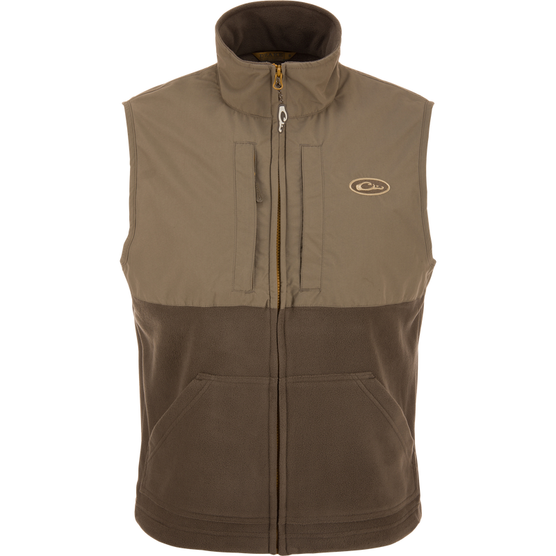 Close-up of the MST Eqwader Vest, highlighting the waterproof upper body with zippered chest pockets and fleece lower torso for breathability, ideal for hunting.