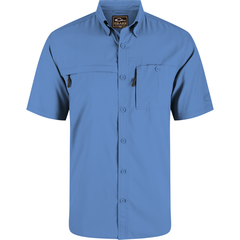 8-Shot Flyweight Shirt with hidden button-down collar, vented cape back, and dual chest pockets with zippers, designed for optimal movement and moisture-wicking.