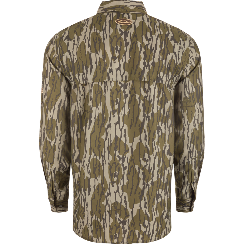 Ole Miss 8-Shot Long Sleeve Shirt in woodland camo pattern, featuring button cuffs, yoke seam, and vented cape back, ideal for hunting or outdoor activities.
