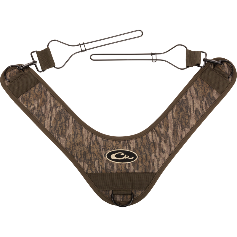 3-Way Duck Tote with Mossy Oak camo pattern features metal hooks and quick-attach clips for carrying shotguns or rifles hands-free across your chest.