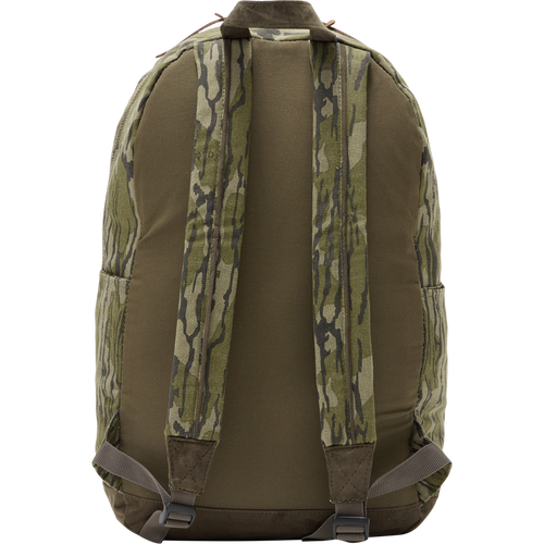 Limited Edition Throwback 80 Backpack with durable cotton canvas and suede bottom, featuring camouflage fabric strap close-up, ideal for rugged outdoor adventures with a 25L capacity.