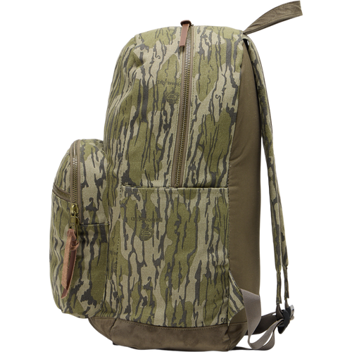 Close-up of the Limited Edition Throwback 80 Backpack featuring rugged cotton canvas, suede reinforcement, durable webbing, and antique bronze hardware, ideal for outdoor adventures.