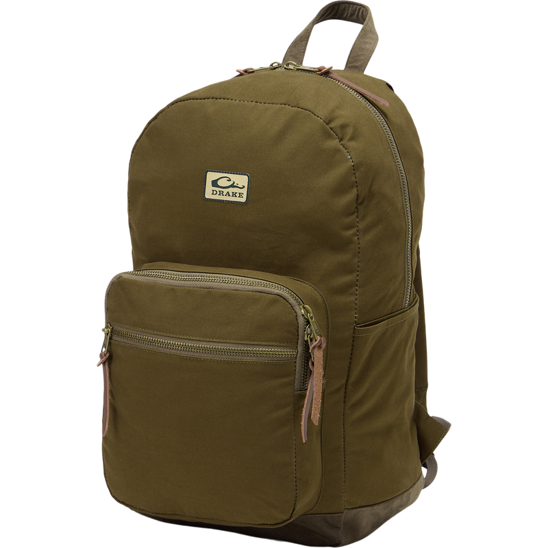 Limited Edition Throwback 80 Backpack with durable cotton canvas, suede bottom, and antique bronze buckles, ideal for rugged outdoor adventures and extensive hauling needs.