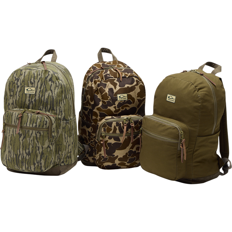 Limited Edition Throwback 80 Backpack with rugged 10.4oz cotton canvas, suede bottom, antique bronze buckles, and 25L capacity, ideal for durable hauling needs.