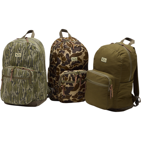 Limited Edition Throwback 80 Backpack with rugged 10.4oz cotton canvas, suede bottom, antique bronze buckles, and 25L capacity, ideal for durable hauling needs.