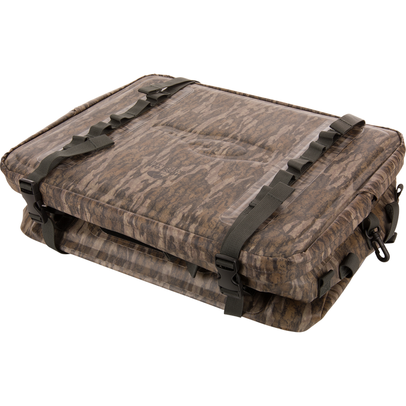 Camo-patterned HND Carry All Collapsible Storage Bag with padded soft-shell, heavy nylon straps, and quick-release buckles, designed for versatile outdoor gear protection.