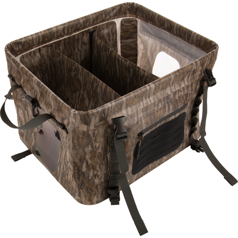 HND Carry All Collapsible Storage Bag with camo pattern, three compartments, side handles, adjustable straps, clear window, and zippered pocket for versatile outdoor gear organization.