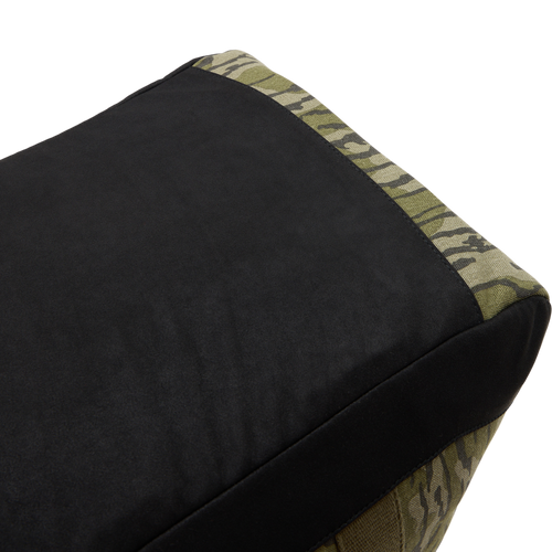 Throwback 80 Duffle Bag close-up showing its durable cotton canvas and suede bottom with antique bronze buckles, ideal for rugged adventures.