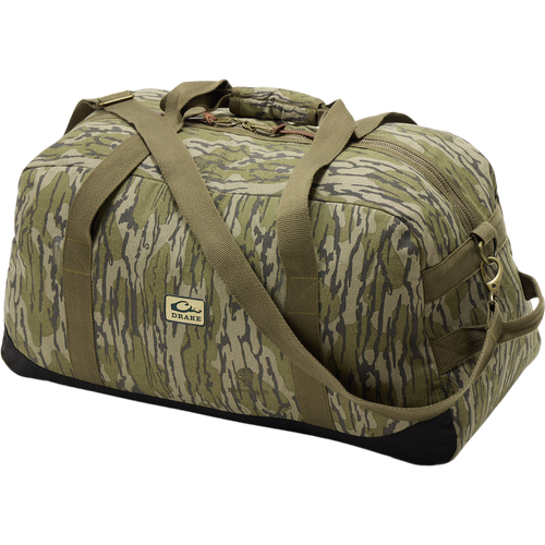 Throwback 80 Duffle Bag close-up showing rugged metal zipper and logo, highlighting durable cotton canvas and suede reinforcement for hunting and adventure gear.