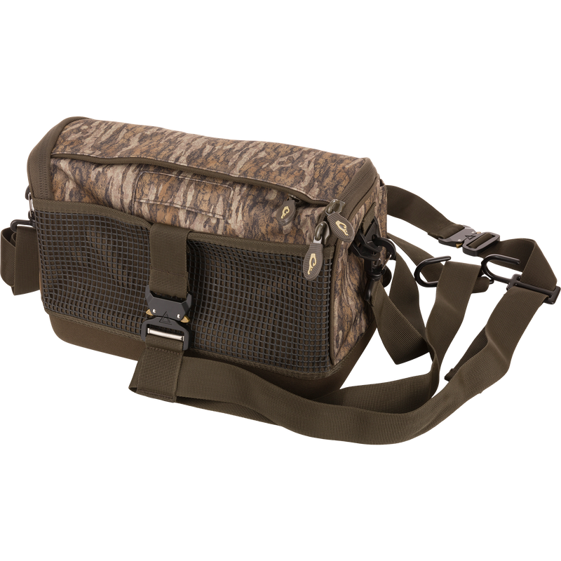 Tree Hugger Shoulder Bag with camo-style fabric, grid-mesh pocket, waterproof bottom, dual zippers, and adjustable strap, ideal for hunting or fishing gear.