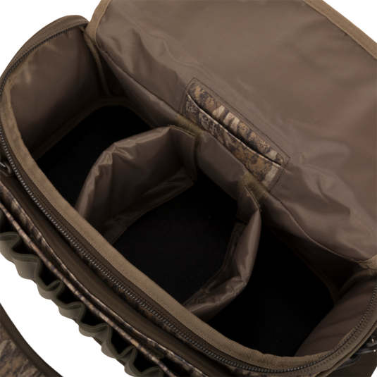Tree Hugger Shoulder Bag with spacious, padded interior, Velcro dividers, and zippered opening, designed for secure outdoor gear storage and organization.