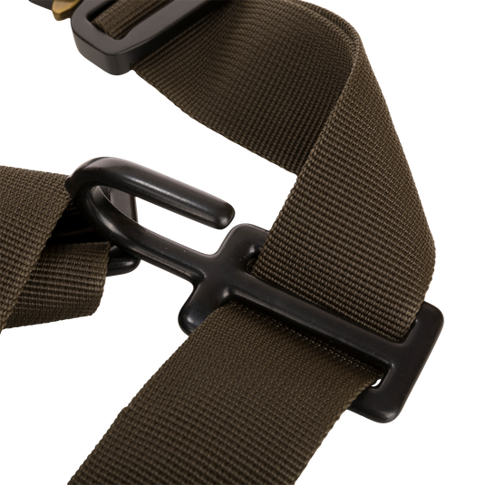 Close-up of the Tree Hugger Shoulder Bag’s olive-green adjustable strap with matte-black hardware, highlighting its rugged construction for outdoor adventures.