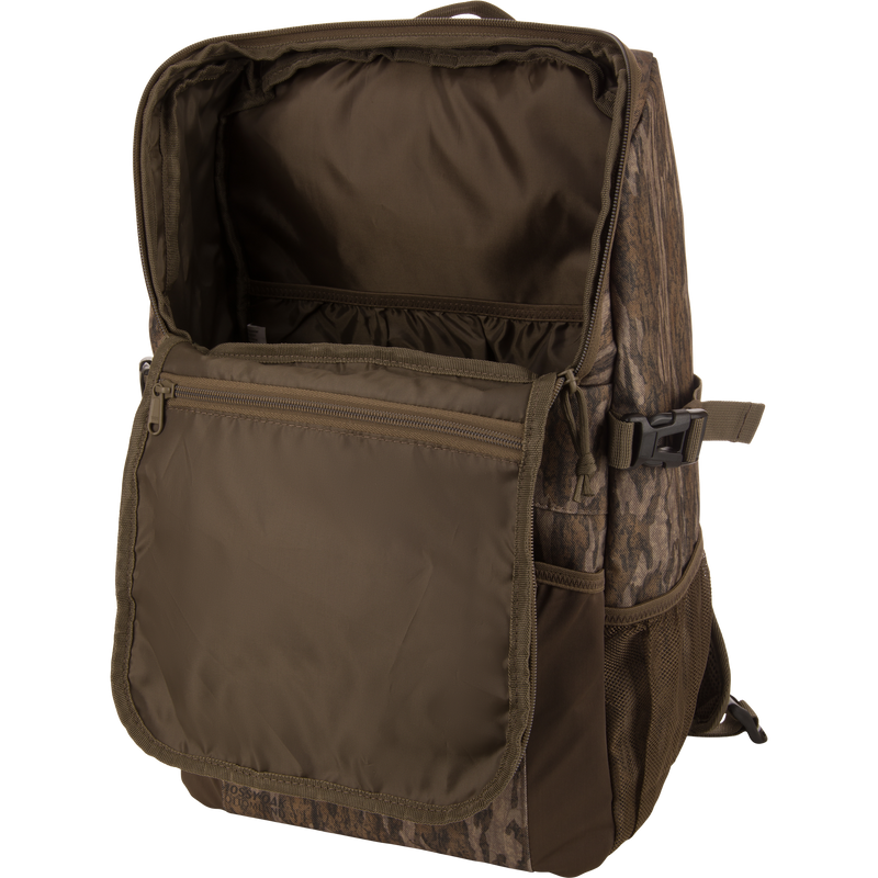 Drake Day Pack with unzipped main compartment, inner pockets visible. Features rugged, water-resistant material, ideal for hunting adventures and outdoor use.