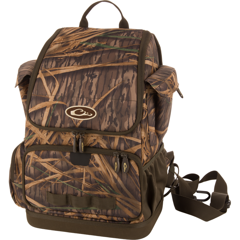 Tree Hugger Timber Day Pack with camo pattern, featuring multiple compartments, padded straps, and gear loops, designed for hunting and outdoor adventures.