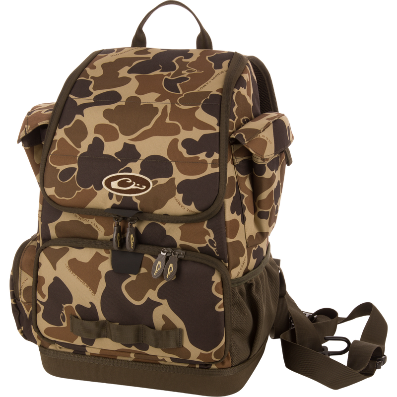 Tree Hugger Timber Day Pack with camo pattern, multiple compartments, padded straps, and included adjustable strap, ideal for outdoor excursions and rugged weather conditions.