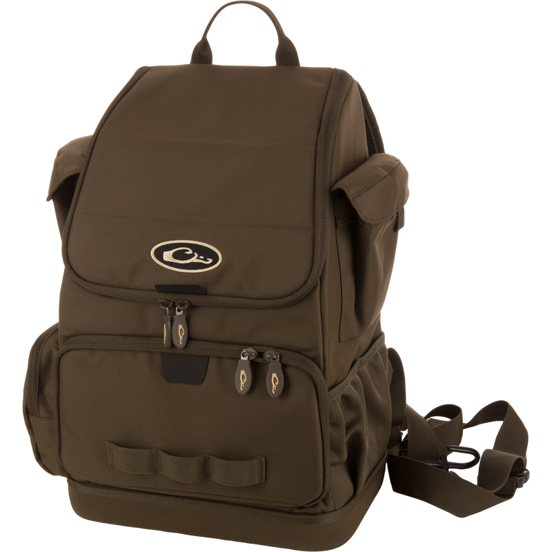 Tree Hugger Timber Day Pack with multiple pockets, adjustable straps, webbing loops, and a top carry handle, designed for durability and easy gear access during outdoor adventures.