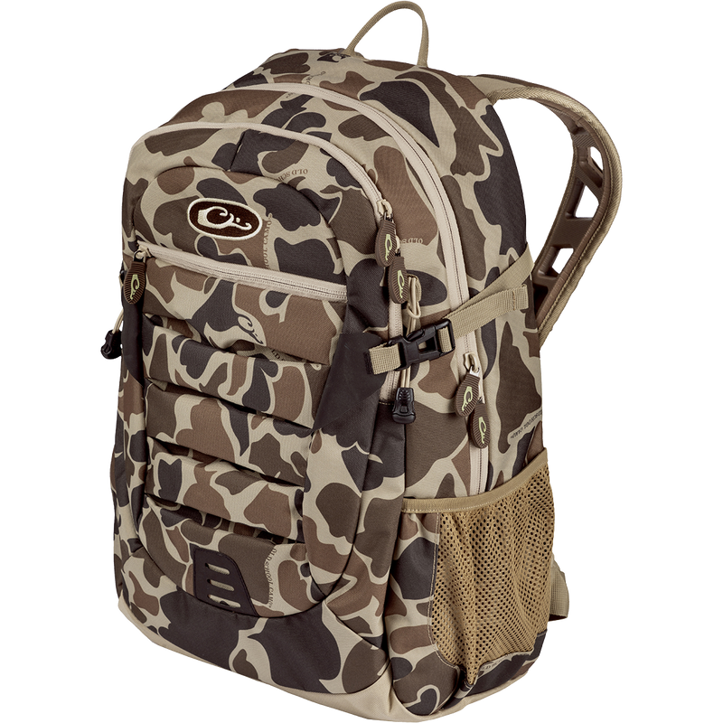 Youth Camo Daypack featuring a rugged design with padded straps, large zippered storage, and hydration pockets, suitable for casual and hunting use.