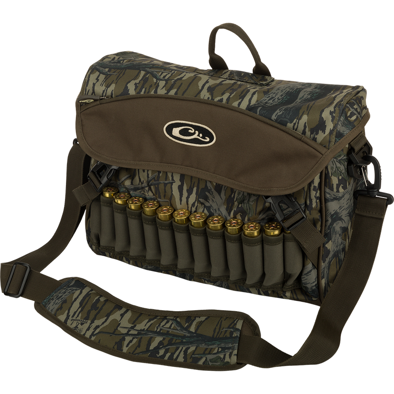 A black Shoulder Bag 2.0 with ammunition and logo. Features adjustable strap, storage pockets, and durable hardware. Ideal for guides and outfitters.