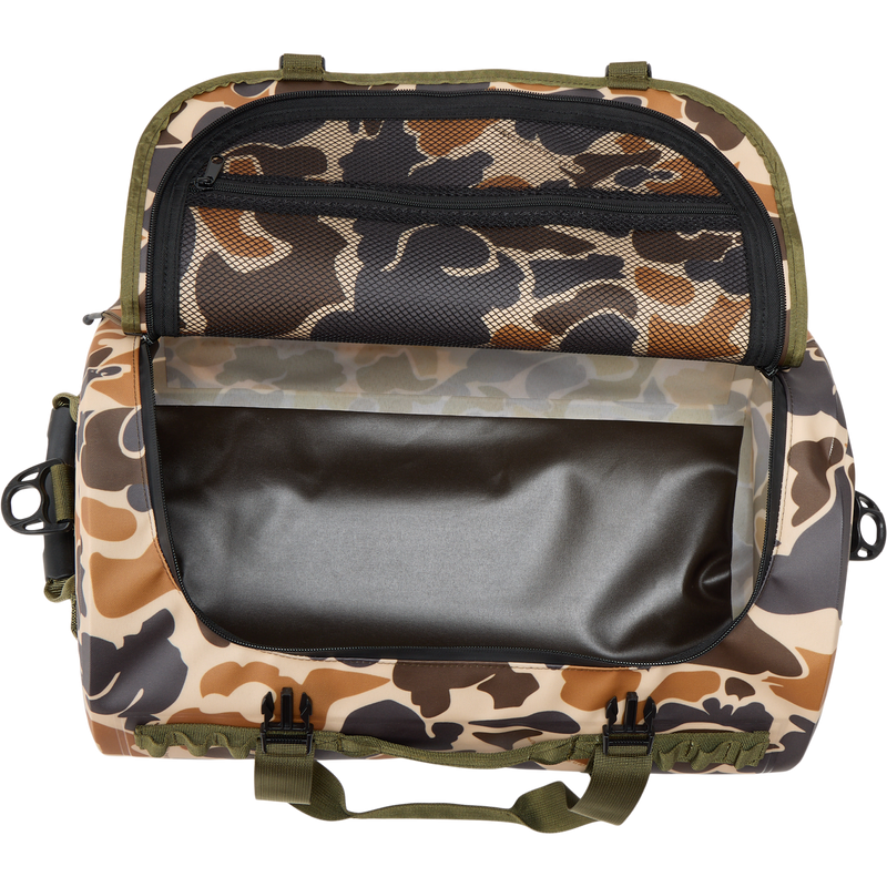 Waterproof Duffel Bag with camo pattern, open to show empty main compartment and zippered mesh pocket under lid; features durable handles and front plastic buckles.
