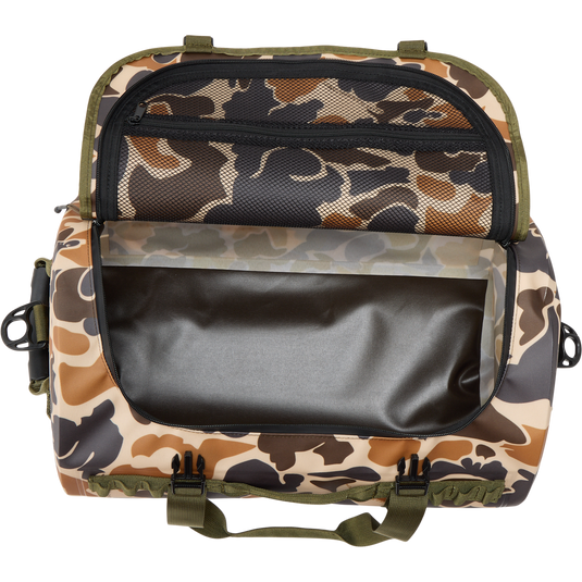 Waterproof Duffel Bag with camo pattern, open to show empty main compartment and zippered mesh pocket under lid; features durable handles and front plastic buckles.