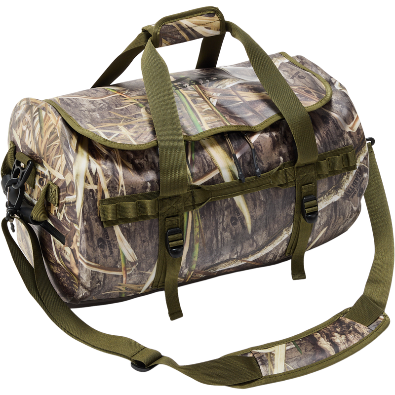 Waterproof Duffel Bag with marsh-grass camouflage, olive-green handles, adjustable strap, attachment loops, and compression straps, designed for outdoor and hunting gear storage.