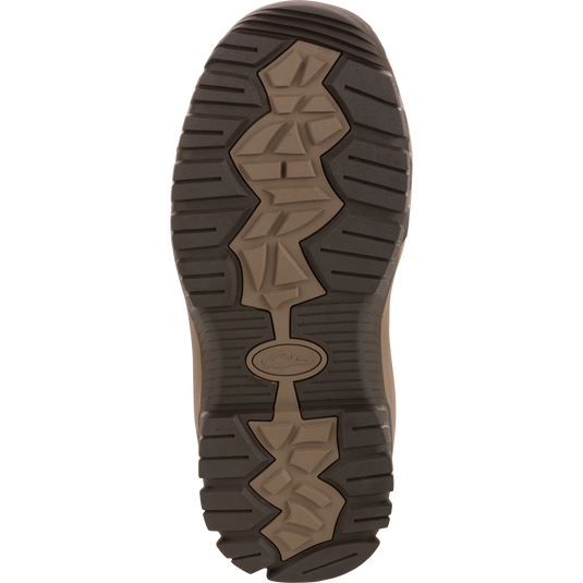 BMF1600 17 Rubber Boot with Primaloft Insulation features a lugged outsole with deep grooves, offering enhanced traction and durability for hunting and outdoor activities.