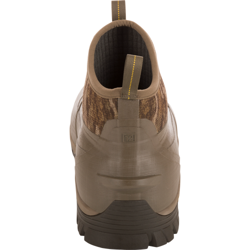 Rear view of BMF1600 17 Rubber Boot with Primaloft Insulation, featuring rubberized shell, lugged outsole, fabric upper, and size 12 molded heel.