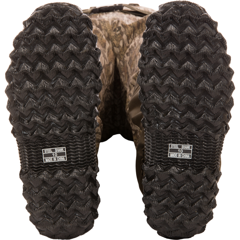 Hardline Uninsulated Breathable Wader soles with deep zig-zag tread, STEEL SHANK 10 MADE IN CHINA label, showcasing durability and reinforced design for outdoor adventures.