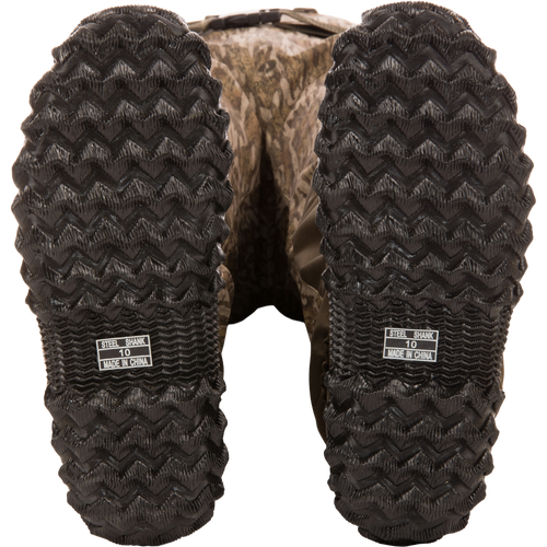 Hardline Uninsulated Breathable Wader soles with deep zig-zag tread, STEEL SHANK 10 MADE IN CHINA label, showcasing durability and reinforced design for outdoor adventures.