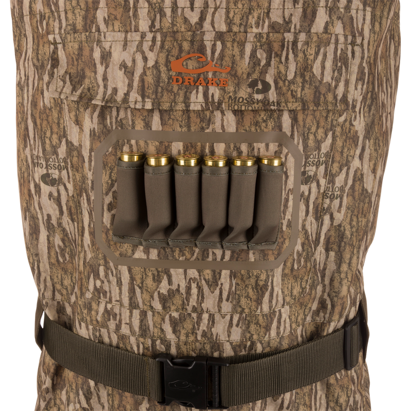 Drake Hardline Uninsulated Breathable Wader with Mossy Oak pattern, featuring a chest cartridge pocket with shotgun shell loops and adjustable waist belt for hunting.