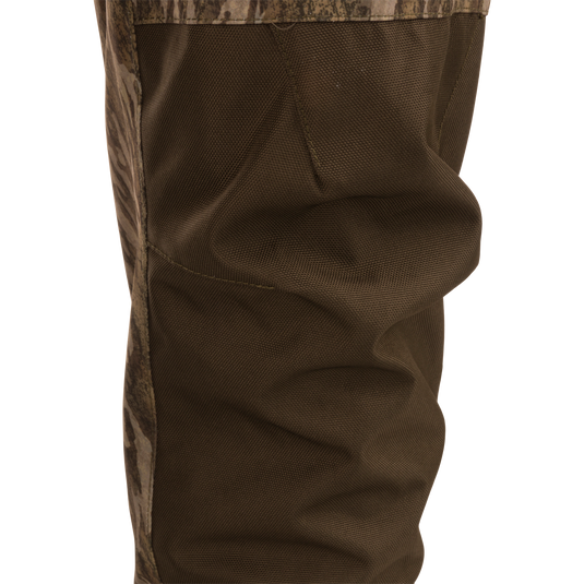 Hardline Uninsulated Breathable Wader featuring reinforced ballistic fabric with camouflage panels, showcasing the textured knee area, ideal for outdoor and hunting adventures.