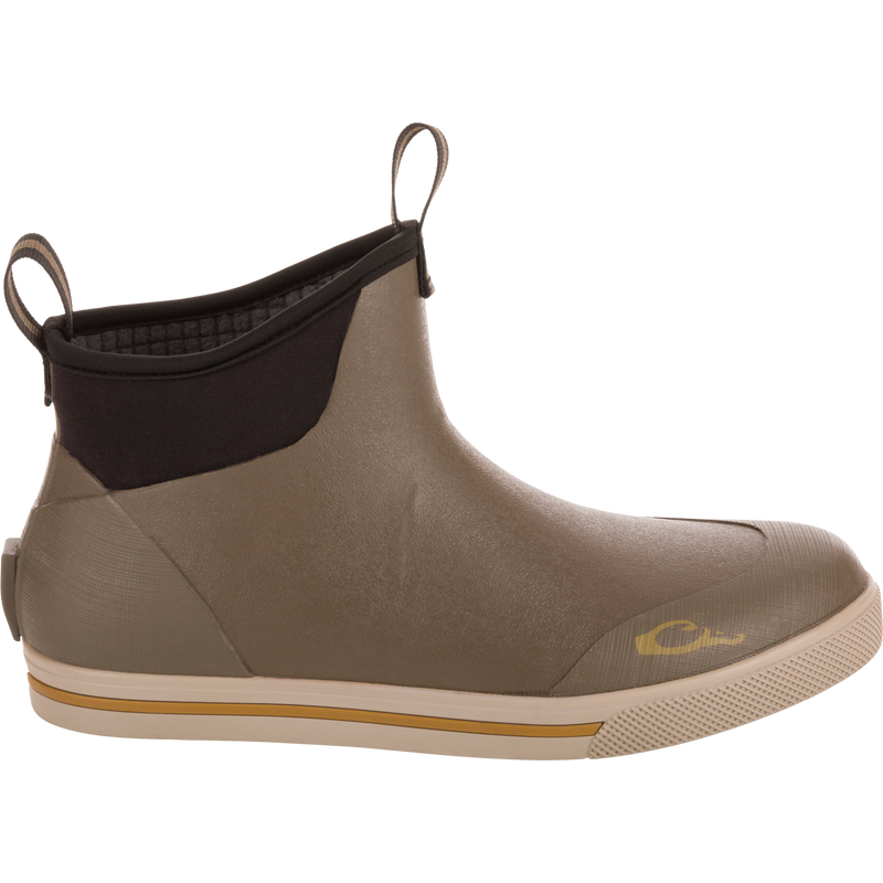 Camp Deck Boot, ankle-height slip-on, waterproof with molded rubber sole, neoprene collar, fabric pull-tabs, non-marking outsole for traction, ideal for wet conditions.