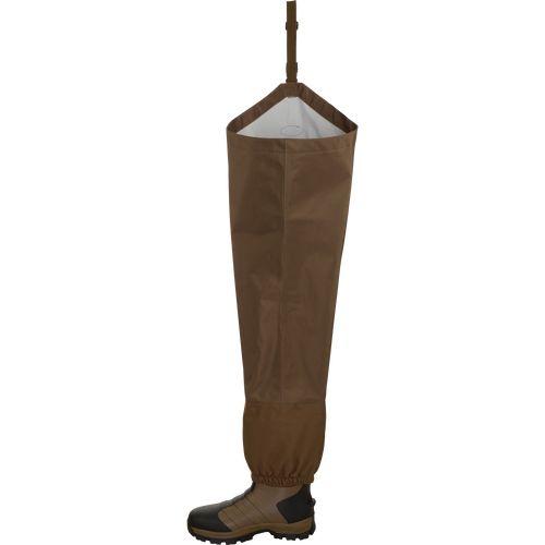 EST Waterfowler’s Hip Boot showcasing breathable, waterproof fabric with molded outsole for traction, ideal for marsh and timber navigation.