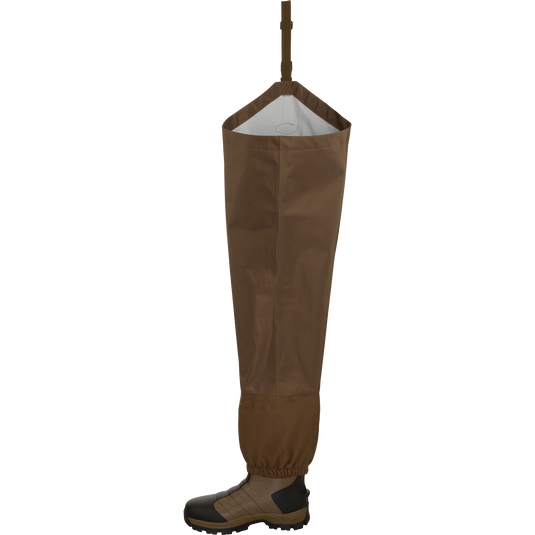 EST Waterfowler’s Hip Boot showcasing breathable, waterproof fabric with molded outsole for traction, ideal for marsh and timber navigation.