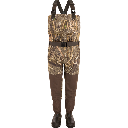 Uninsulated Guardian Elite Vanguard Breathable Wader with camouflage overalls, reinforced taped seams, and 1600g Thinsulate Buckshot Mud Boots, ideal for extreme hunting conditions.