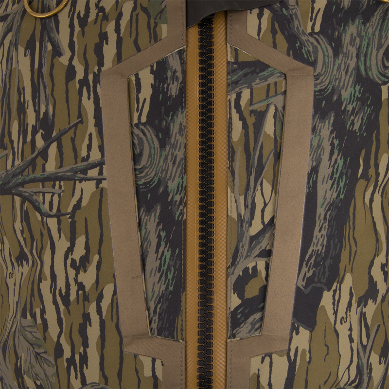 Close-up of BMF1600 Kevlar Wader with Primaloft, showcasing tiger-stripe camo, heavy-duty zipper, and reinforced pockets—designed for durability and water resistance in rugged environments.