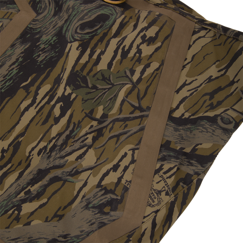 BMF1600 Kevlar Wader with Primaloft, showcasing tiger-stripe camo-patterned fabric, tan binding, and metal ring, designed for superior durability and water resistance.