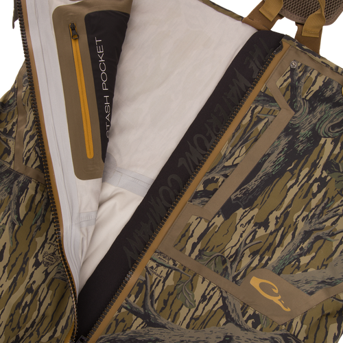 Close-up of the BMF1600 Kevlar Wader with Primaloft showing the interior stash pocket, camo fabric, and YKK™ Aquaseal® waterproof zipper, highlighting advanced design features.