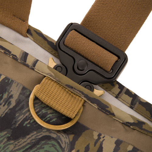 Close-up of BMF1600 Kevlar Wader with Primaloft, featuring a tan nylon webbing, black quick-release buckle, and brass D-ring on camouflage fabric.
