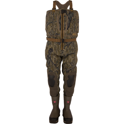 BMF1600 Kevlar Wader with Primaloft, featuring woodland camouflage, adjustable suspenders, front zipper, reinforced knees, and built-in boots for advanced waterfowl hunting protection.