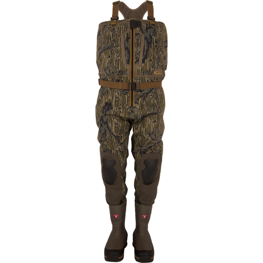 BMF1600 Kevlar Wader with Primaloft, featuring woodland camouflage, adjustable suspenders, front zipper, reinforced knees, and built-in boots for advanced waterfowl hunting protection.