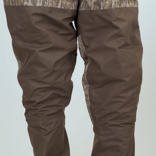 Insulated Breathable Chest Wader with Sewn-in Liner for hunters by Purewhitelaneshop. Features LokDown insulation, HD2 protection, and 1200g Thinsulate Mud Boot. Durable and versatile hunting gear.