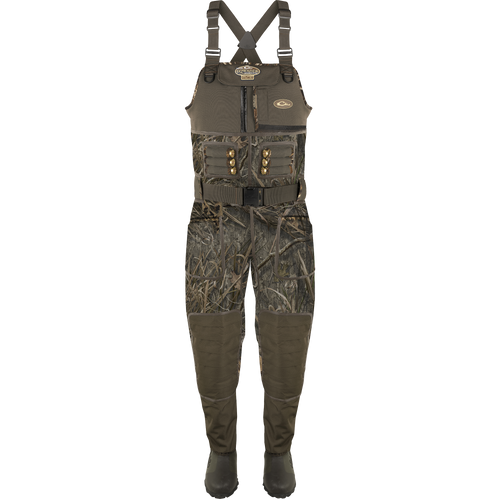 Buckshot Eqwader 1600 Neoprene Wader 3.0 displayed with camouflage overalls, emphasizing its durable construction and comprehensive seam protection for waterfowl hunting.