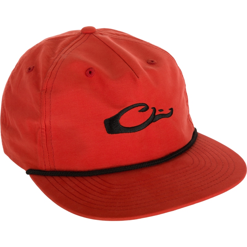 Drake Logo Rope Cap, a low-profile red hat with black logo, flat bill, adjustable snap-back closure, and breathable cotton/nylon fabric for sun protection.
