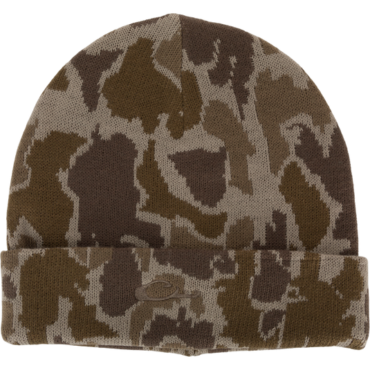 LST Acrylic Beanie from Purewhitelaneshop: Camouflage knit fabric with 3mm foam stitch, featuring a flat stitch Drake logo. Ideal for outdoor activities, one-size-fits-most design for comfort.