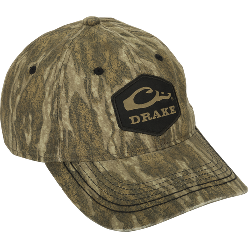 Camo Cotton Twill Hex Patch Cap - A low-profile hat with a black logo, perfect for any adventure. Breathable and durable, with unstructured front panels and a secure hook and loop closure. Conquer the wild in this bold cap!